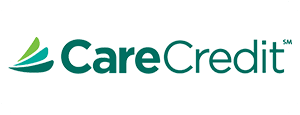 CareCredit logo featuring a green stylized swoosh design and text.