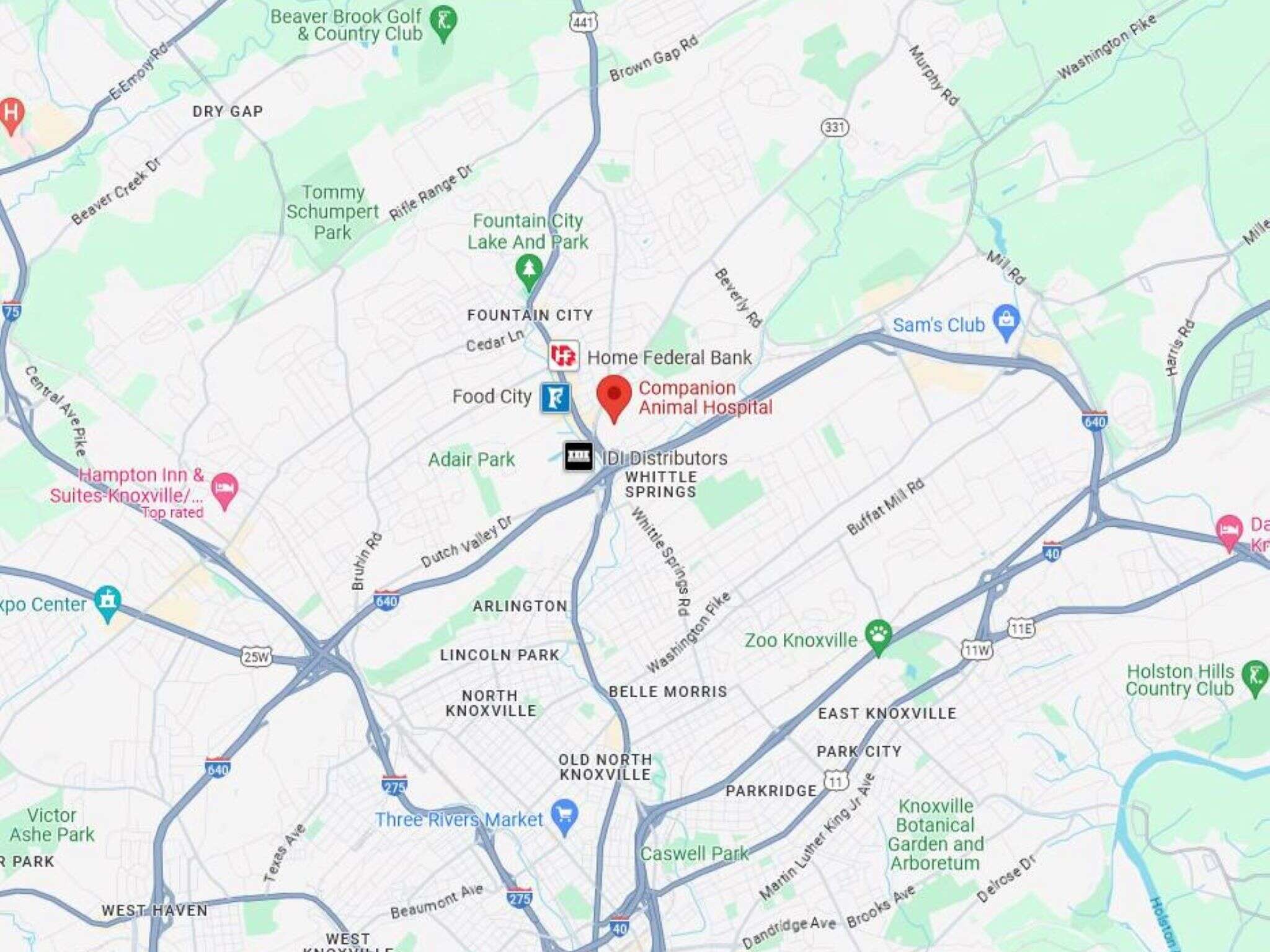Map showing location markers for Home Federal Bank and Companion Animal Hospital in Knoxville, with nearby highways and parks.