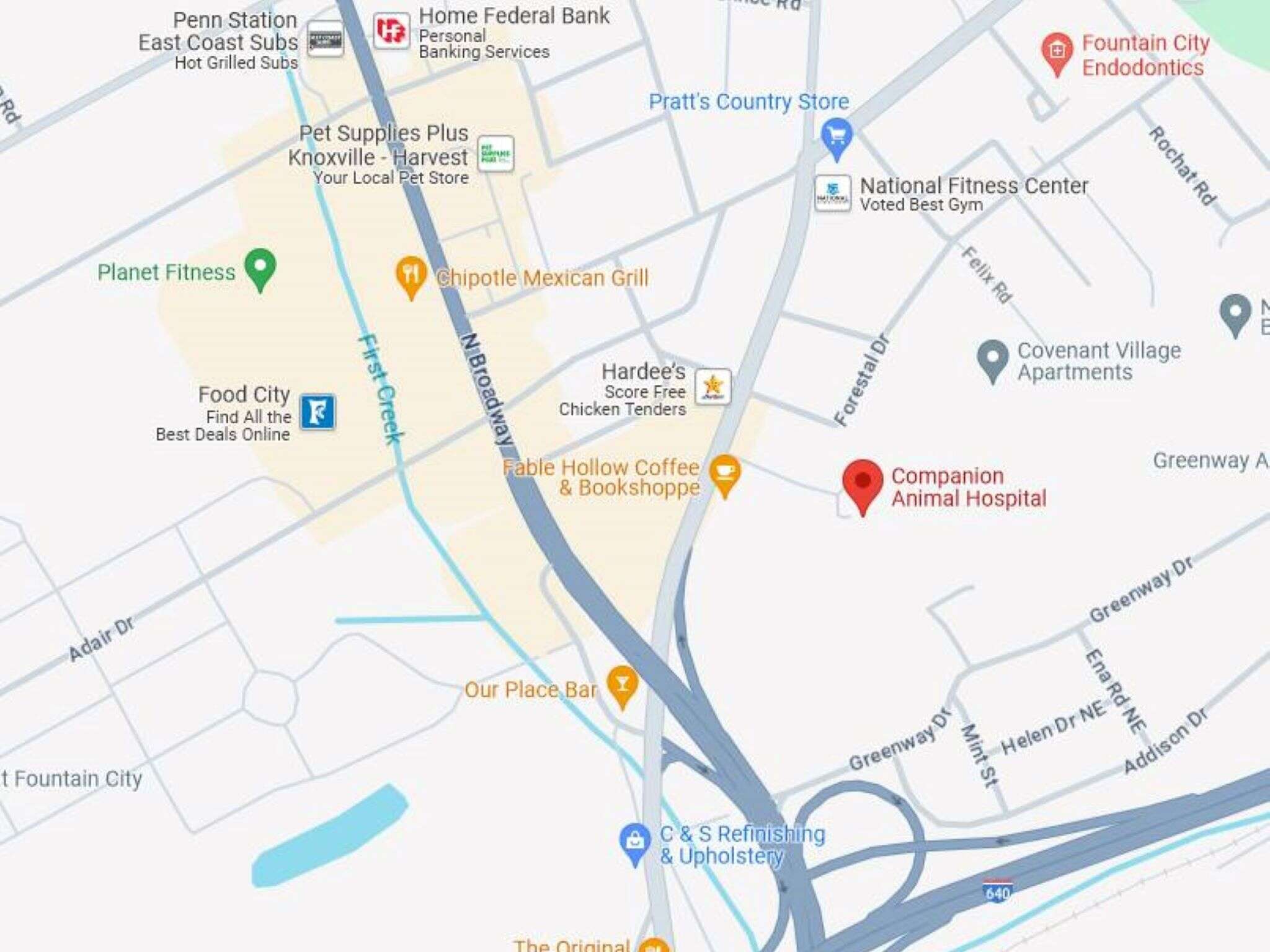 Map showing roads, businesses, and landmarks in a city, highlighting Companion Animal Hospital and nearby locations.